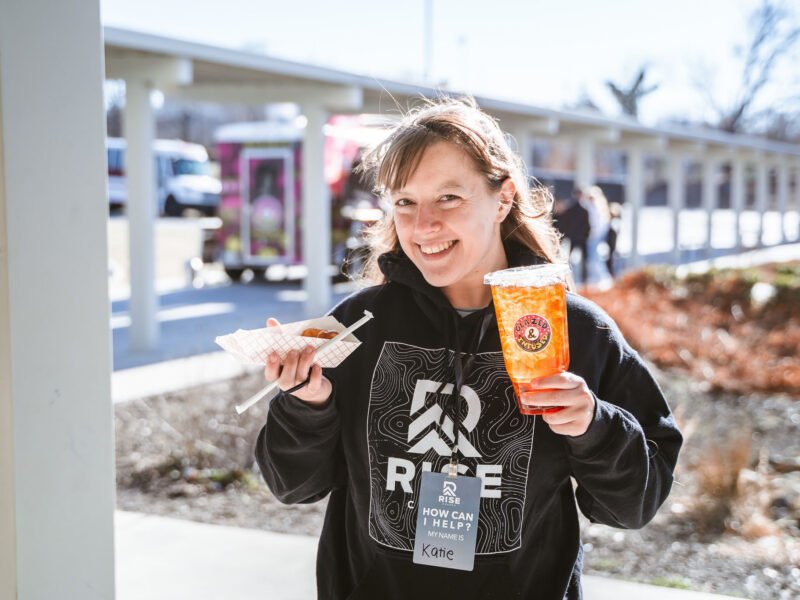 Rise Church Asheville Middle School Team Member enjoying donuts