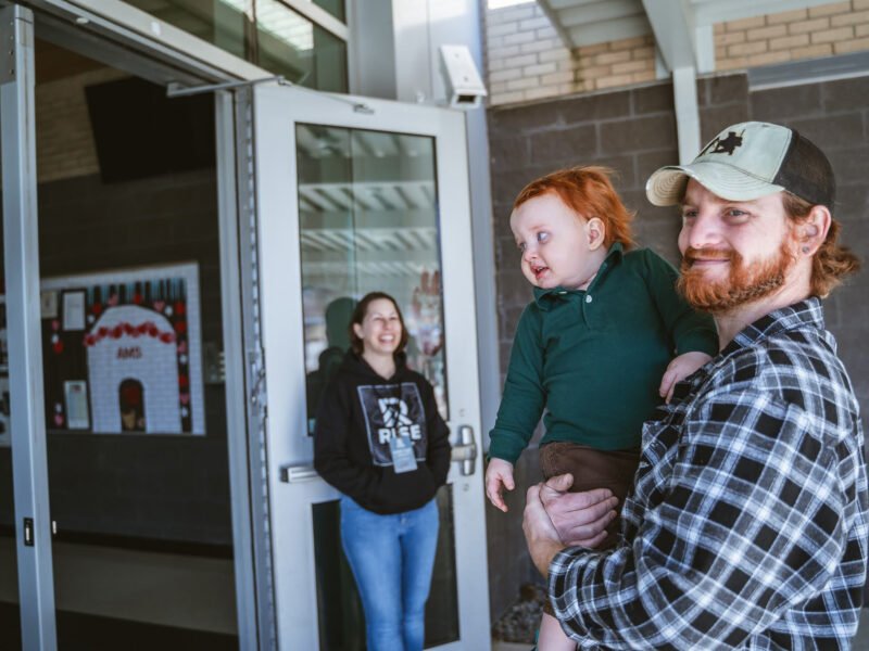 Rise Church Asheville Middle School familie entering building
